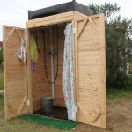 wooden summer shower for the cottage