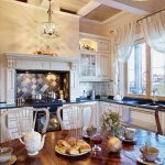 Design of a wooden house in Provence style in the village of Piskovo - photo of the kitchen