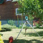 Geodetic GPS receiver during measurements of a summer cottage