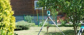 Geodetic GPS receiver during measurements of a summer cottage