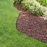 Brown wood mulch in landscaping