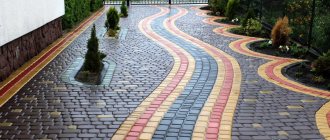 Paving a yard in a suburban area with paving slabs