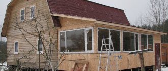 Extension to the house of a frame veranda