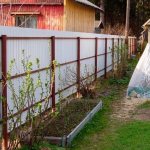 corrugated fence between areas