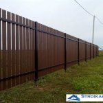 Fence on screw piles